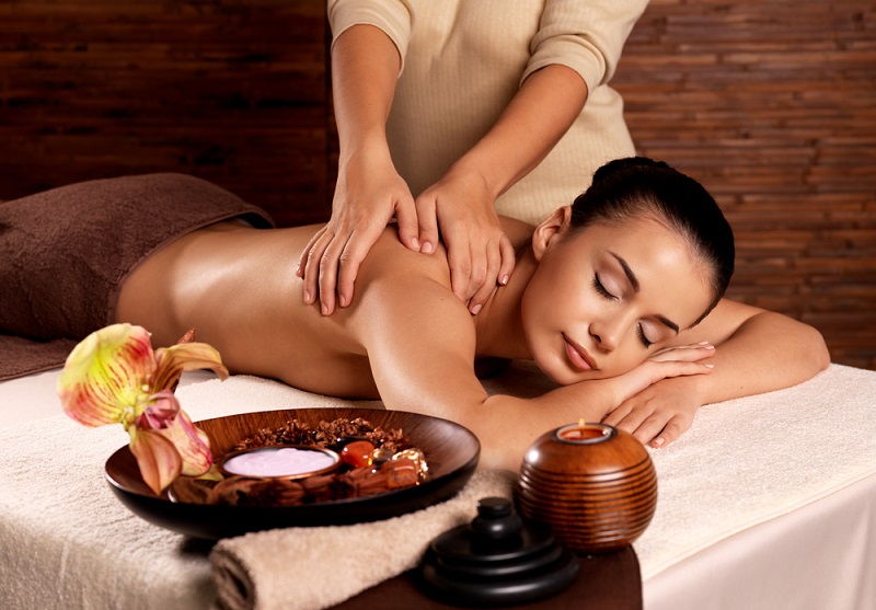 Woman having massage in the spa salon